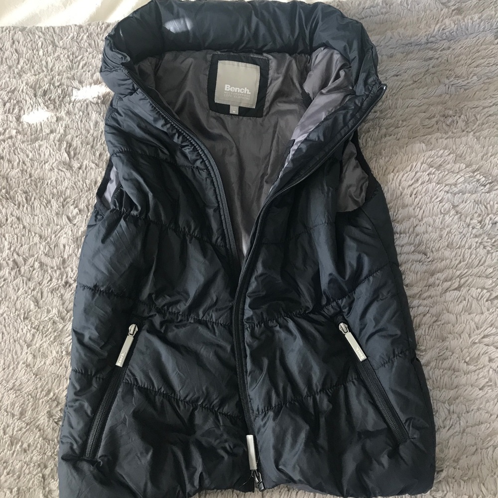 Bench fluffy vest with hideaway hoodie